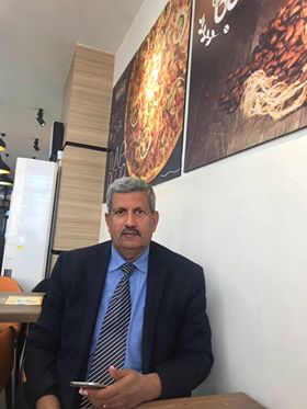 مهاجر - الشاعر العراقي د. حسين الحلي الزبيدي